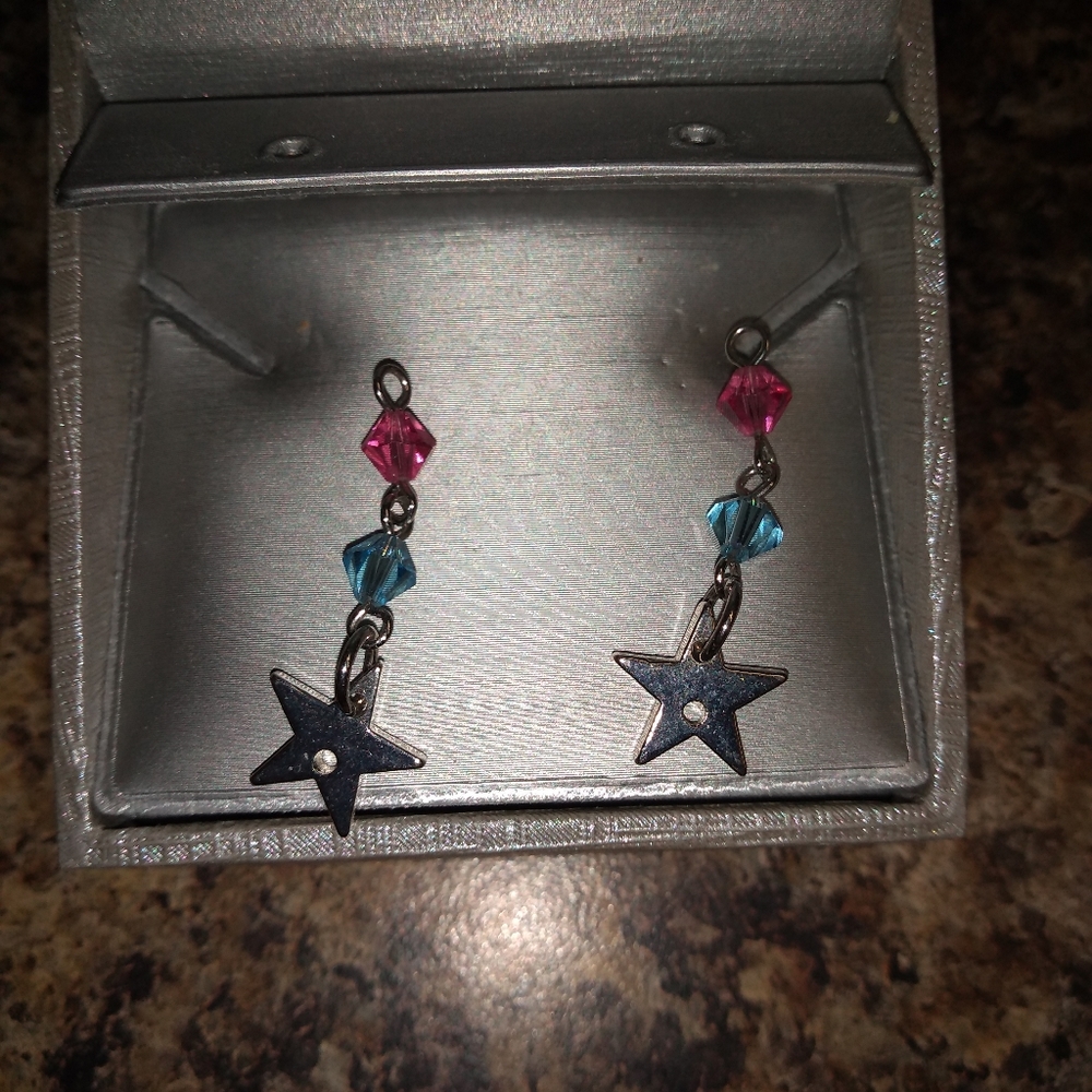 Silver Star earrings brand new never worn
